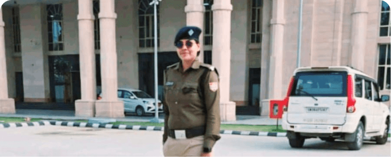 Young woman in uniform standing outside
